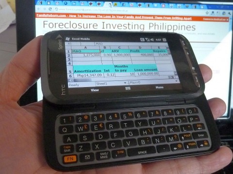 My HTC Touch Pro 2 with my property analyzer excel sheet loaded