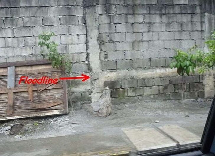 floodline on concrete wall 3