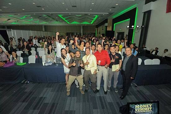 During last year's Money Summit and Wealth Expo. I'm the one in red beside Fitz Villafuerte (in yellow) and Floi Wycoco (in black). Heinz Bulos, President of Learning Curve is on the foreground at the right (with glasses)