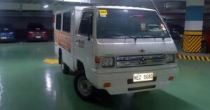 2025 MITSUBISHI L300 C/C WITH FB BODY WITH DUAL AC (Plate#: NEZ5080) from Eastwest Bank